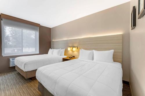Habitación cuádruple con 2 camas grandes - No fumadores del hotel Country Inn & Suites by Radisson, Staten Island. Foto 2