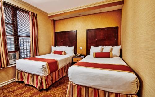 Estudio con 2 camas individuales del hotel Radio City. Foto 1