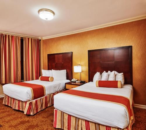 Estudio Deluxe con 2 camas dobles del hotel Radio City. Foto 2