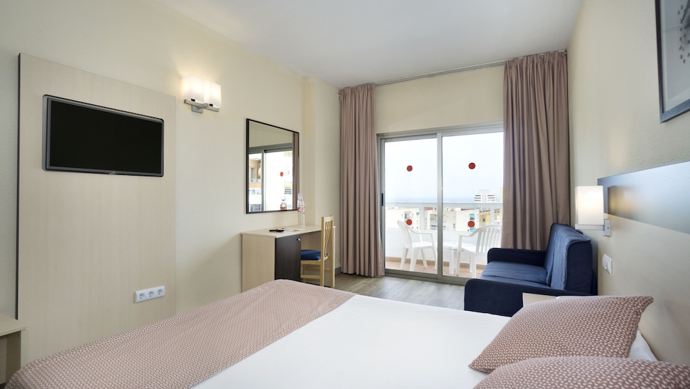 Habitación cuádruple Balcón o Terraza 1 Cama queen Sofá Cama incluido del hotel Sandos Griego