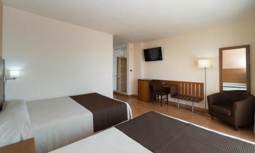 Habitación Cuádruple del hotel Rincon Sol. Foto 4