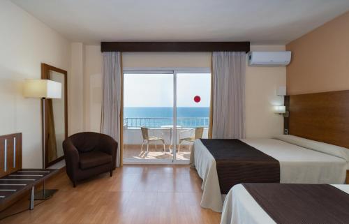 Habitación Cuádruple del hotel Rincon Sol. Foto 5