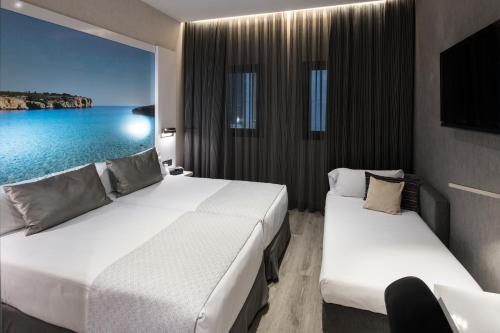 Habitación Triple del hotel Catalonia Gran Vía Bcn. Foto 3