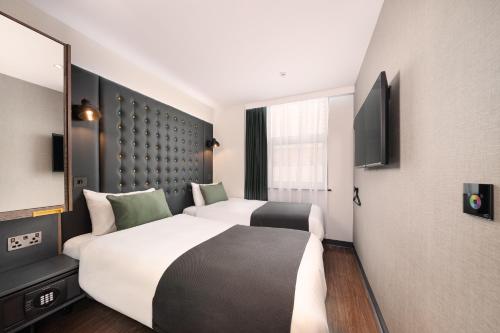 Habitación Doble con 2 camas, acogedora y con vistas del hotel Point A - Westminster, London. Foto 1