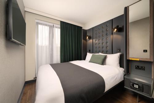 Habitación doble acogedora con ventana del hotel Point A - Westminster, London. Foto 1