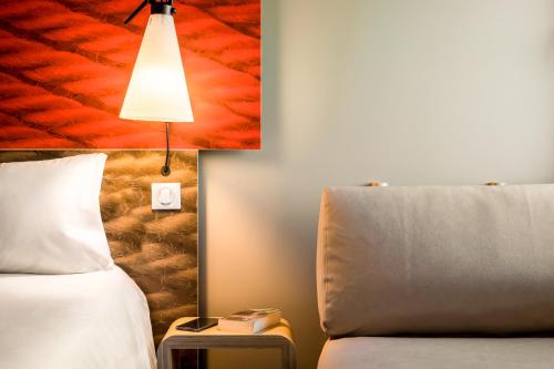 Habitación Doble con Cama supletoria del hotel Ibis Faro Algarve. Foto 4