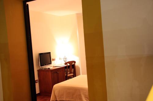 Habitación Individual del hotel Hospedium Cortijo Santa Cruz. Foto 1