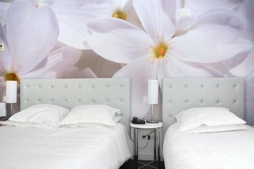 Habitación Triple Deluxe del hotel Albe Saint-michel. Foto 3