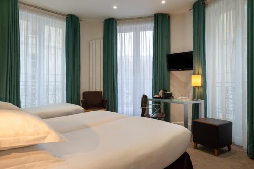 Habitación Triple Deluxe del hotel Albe Saint-michel. Foto 6