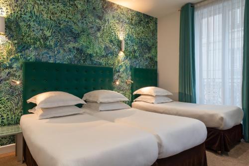 Habitación Triple Deluxe del hotel Albe Saint-michel. Foto 7