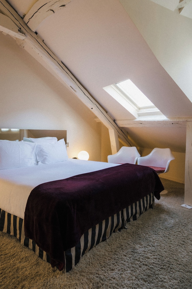 Habitación Deluxe del hotel Du Petit Moulin. Foto 14