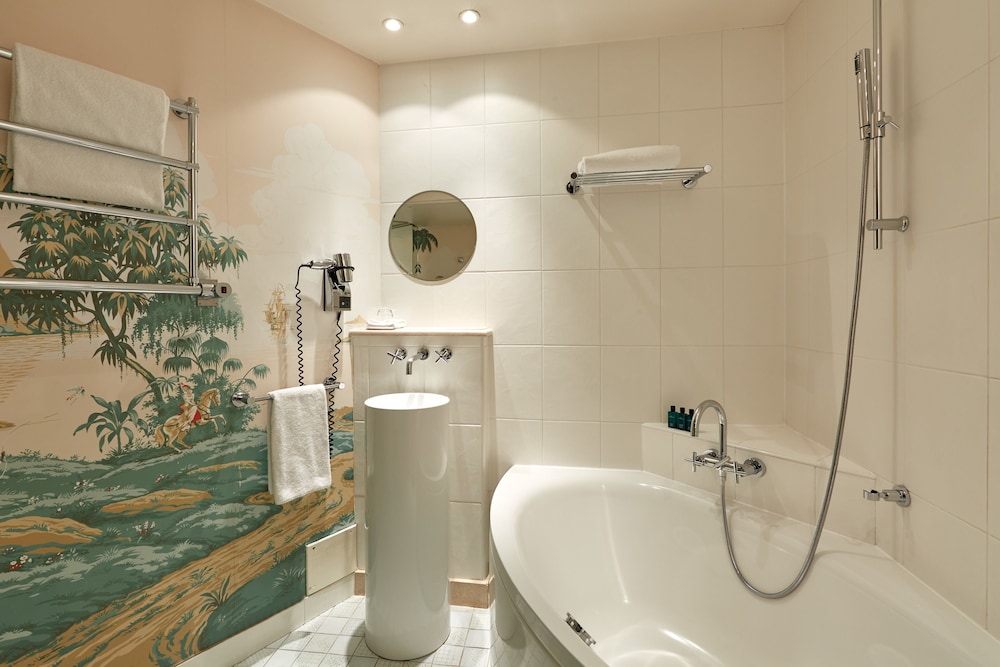 Habitación Deluxe del hotel Du Petit Moulin. Foto 18