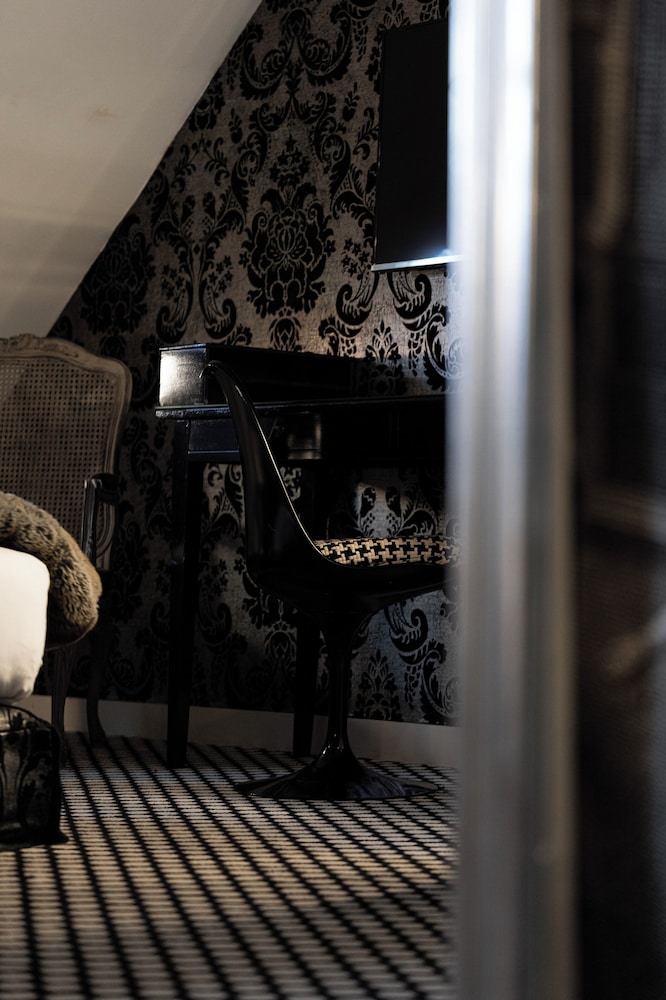 Suite junior del hotel Du Petit Moulin. Foto 2