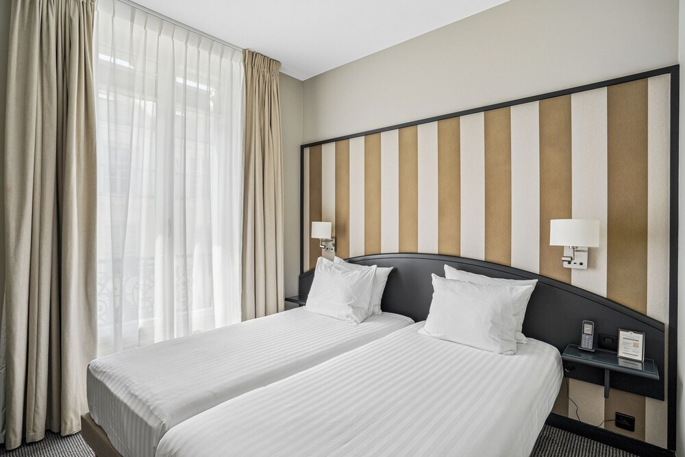 Habitación con 2 camas individuales, no fumadores del hotel Excelsior Opéra. Foto 1
