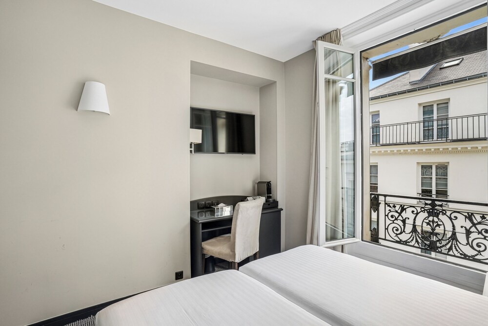 Habitación con 2 camas individuales, no fumadores del hotel Excelsior Opéra. Foto 2