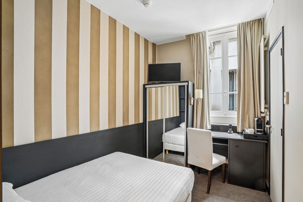 Habitación Individual del hotel Excelsior Opéra. Foto 1