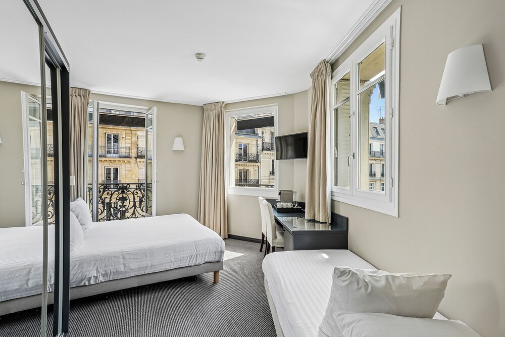 Habitación Triple del hotel Excelsior Opéra. Foto 1