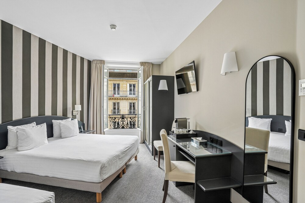 Habitación Triple del hotel Excelsior Opéra. Foto 3