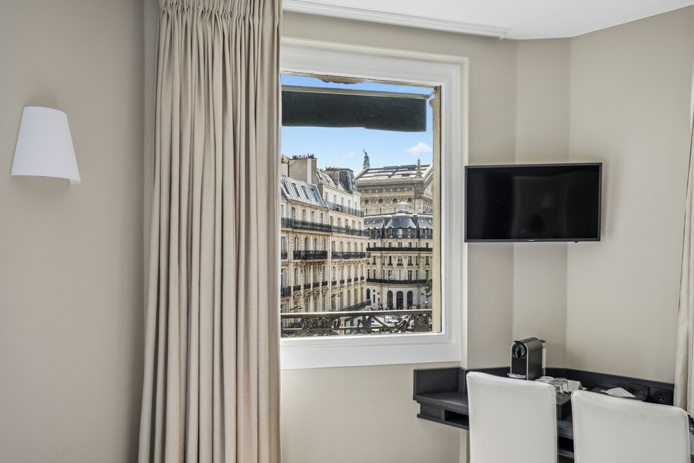 Habitación Triple del hotel Excelsior Opéra. Foto 4