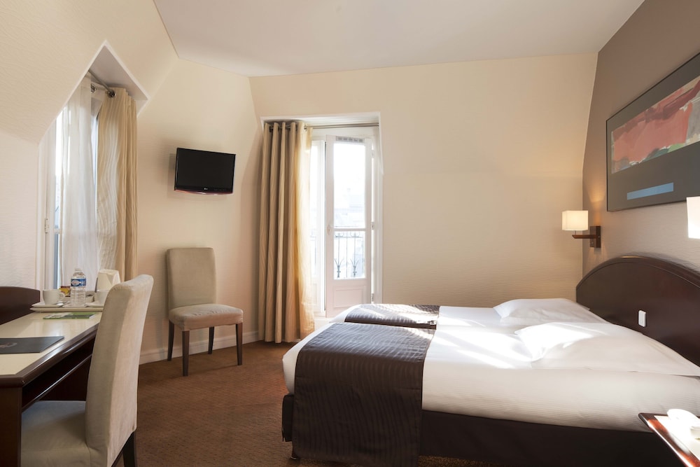 Habitación con 2 camas individuales, no fumadores del hotel Excelsior Opéra. Foto 1