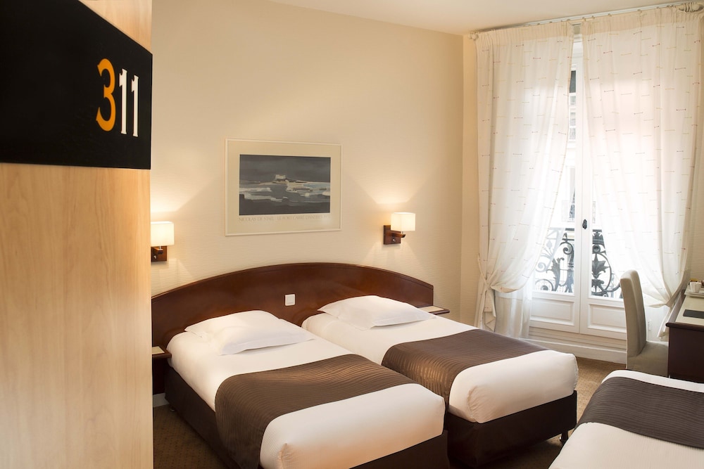 Habitación triple del hotel Excelsior Opéra. Foto 6
