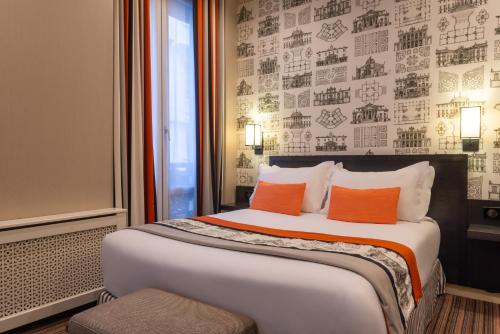 Habitación Doble Estándar del hotel France D'antin Opéra. Foto 1