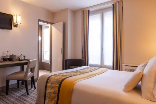Habitación Doble Estándar del hotel France D'antin Opéra. Foto 5