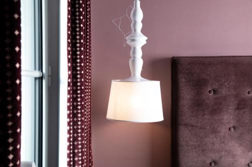 Habitación Doble Deluxe con balcón del hotel Marais HÔme. Foto 3