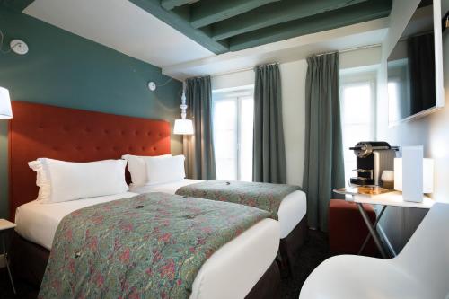 Habitación Doble Superior - 1 o 2 camas del hotel Marais HÔme. Foto 1