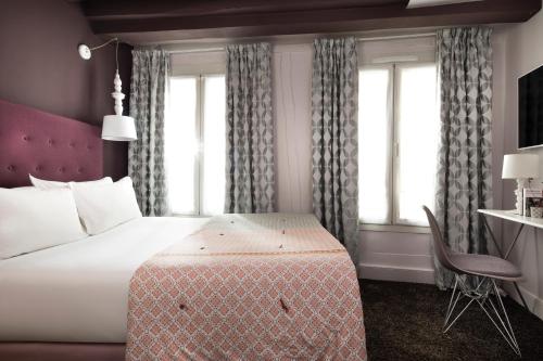 Habitación Doble Clásica del hotel Marais HÔme. Foto 1