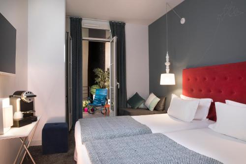 Habitación Triple del hotel Marais HÔme. Foto 3