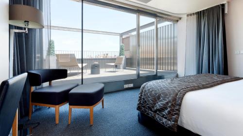 Habitación Doble Deluxe con terraza del hotel Royal Passeig De Gracia. Foto 3