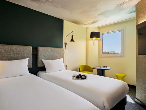 Habitación Doble Estándar - 2 camas del hotel Ibis Nice Centre Gare. Foto 3