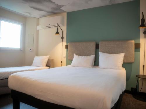 Habitación Estándar - 1 cama doble y 1 individual del hotel Ibis Nice Centre Gare. Foto 2
