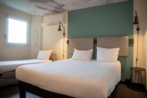 Habitación Estándar - 1 cama doble y 1 individual del hotel Ibis Nice Centre Gare. Foto 4