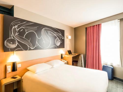 Habitación Estándar con 1 cama doble y 2 camas individuales del hotel Ibis Paris Nord Villepinte Parc Des Expositions