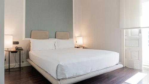 Habitación Doble Deluxe con cama supletoria del hotel Sardinero Madrid. Foto 4