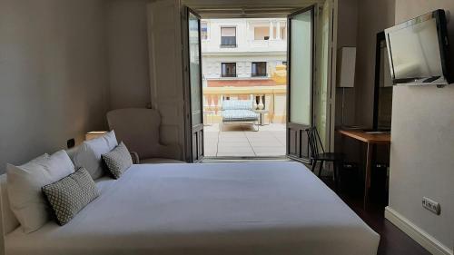 Habitación Doble Premium con terraza del hotel Sardinero Madrid. Foto 3