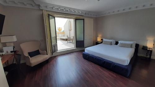 Habitación Doble Premium con terraza del hotel Sardinero Madrid. Foto 8