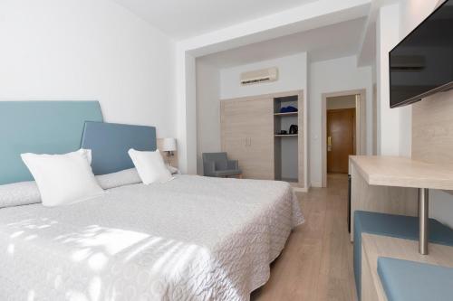 Habitación Doble Económica del hotel Palia Las Palomas. Foto 1