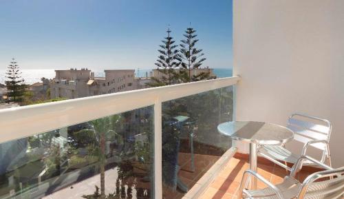 Habitación Doble con vistas parciales al mar del hotel Palia Las Palomas. Foto 1