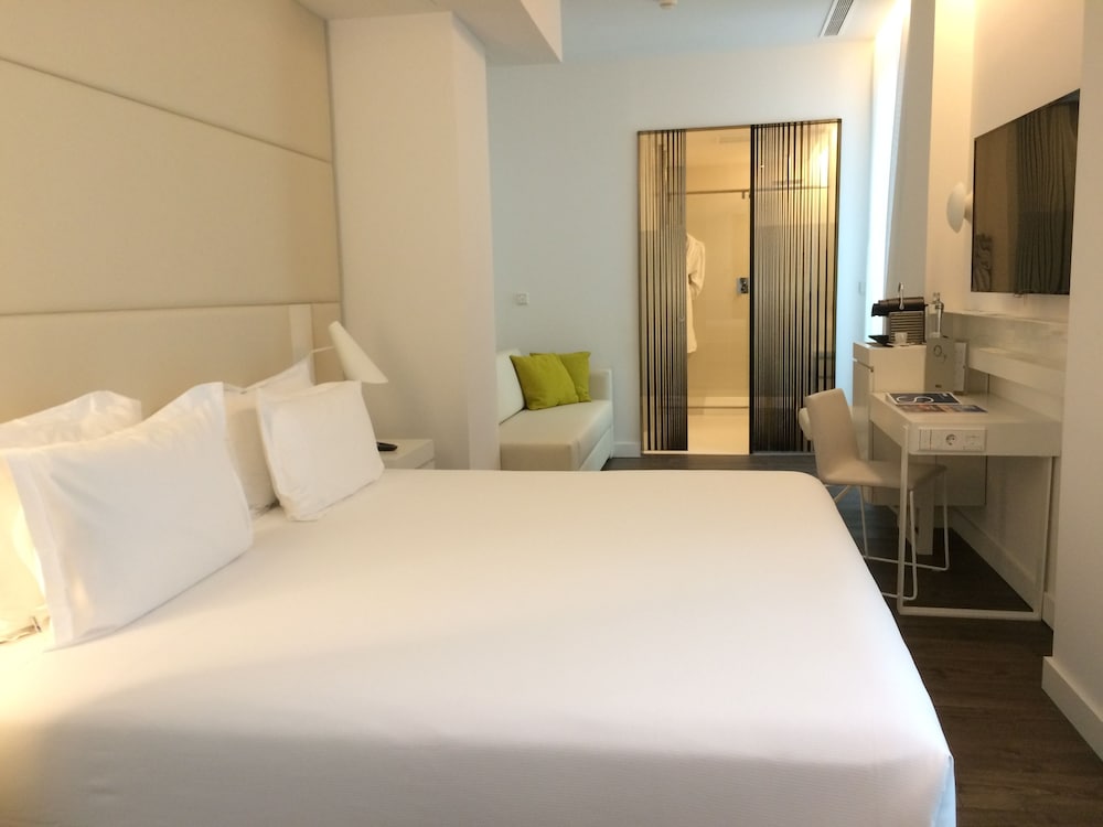 Habitación familiar doble del hotel H10 Urquinaona Plaza