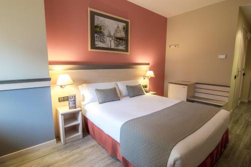 Habitación Cuádruple del hotel Petit Palace Trencadís