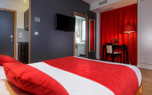Habitación Doble Deluxe del hotel Ambre Hotel. Foto 4