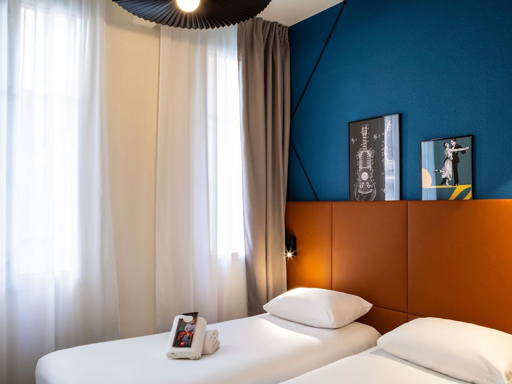 Habitación estándar, 2 camas individuales del hotel Ibis Paris Ornano Montmartre Nord 18ème. Foto 6