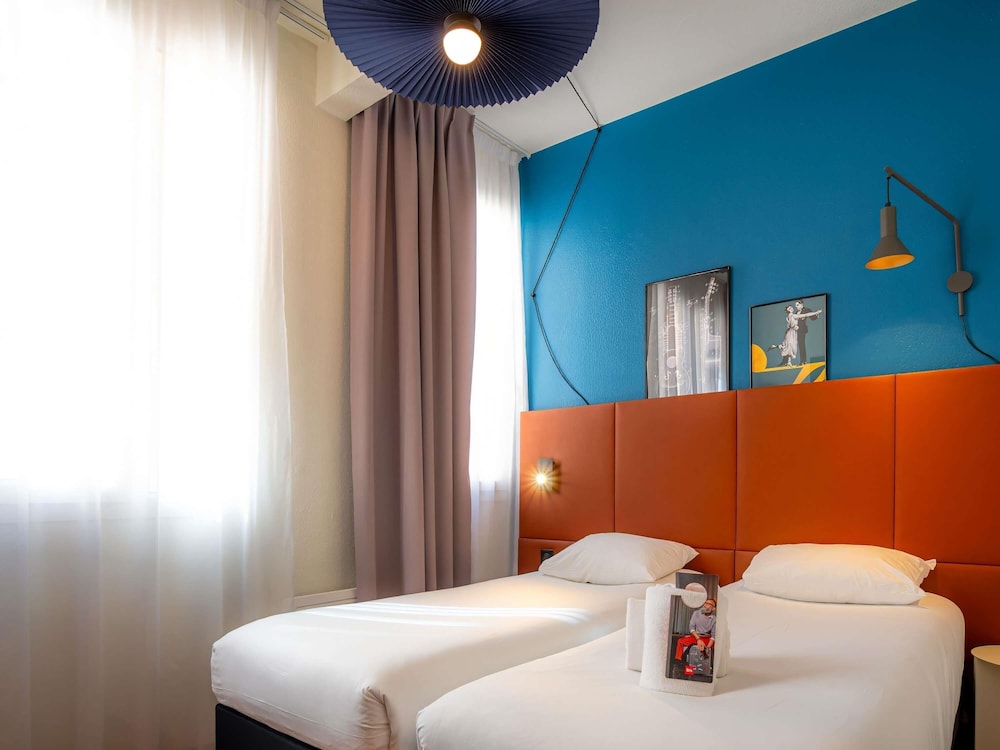 Habitación estándar, 2 camas individuales del hotel Ibis Paris Ornano Montmartre Nord 18ème. Foto 9
