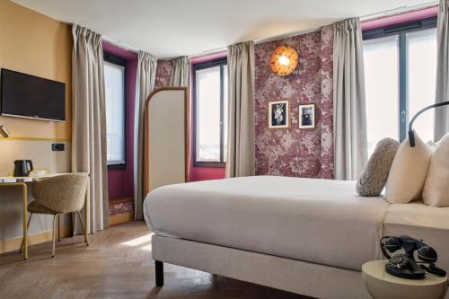 Habitación Triple del hotel Josephine By Happyculture. Foto 2