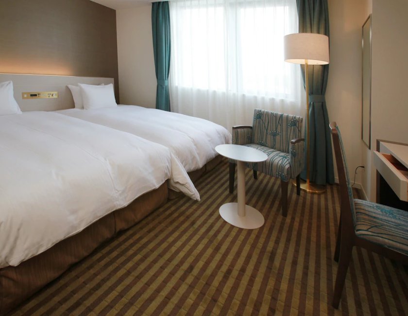 Habitación estándar con 2 camas individuales, no fumadores del hotel Chisun Grand Takayama. Foto 1