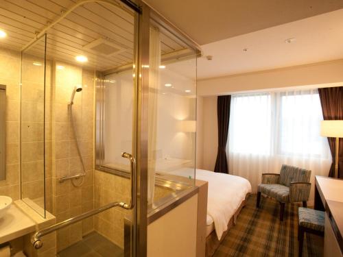 Habitación Doble Estándar - Cama doble pequeña del hotel Chisun Grand Takayama. Foto 2