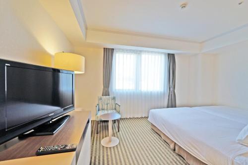 Habitación Doble adaptada para personas con discapacidad - 2 camas del hotel Chisun Grand Takayama. Foto 1